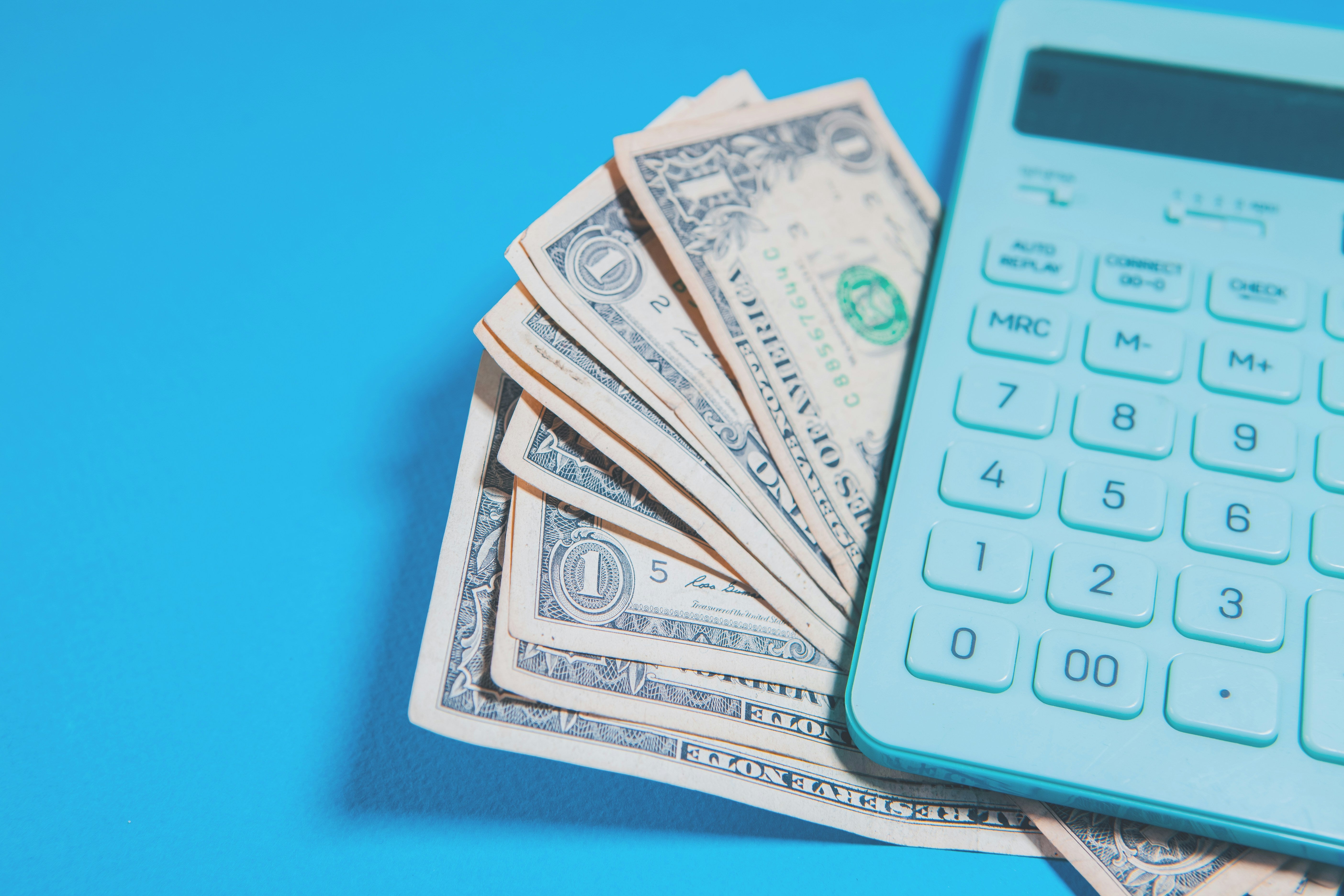budget billing image of money and a calculator