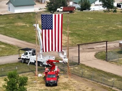 Fergus Electric flying an American Flag